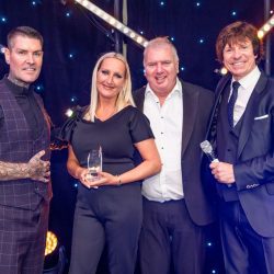 Claire Dante receives an award