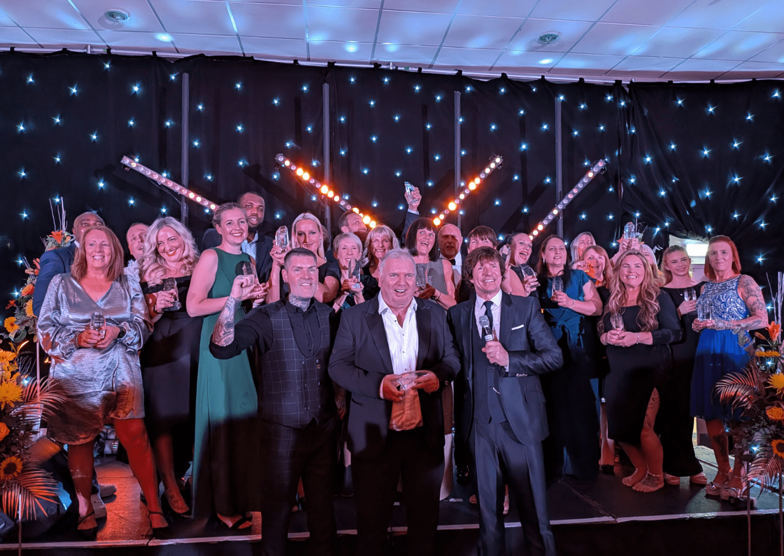People at a award ceremony celebrating