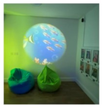 Sensory room with bean bags and room projector light