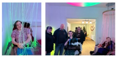 Sensory room with lights and people smiling